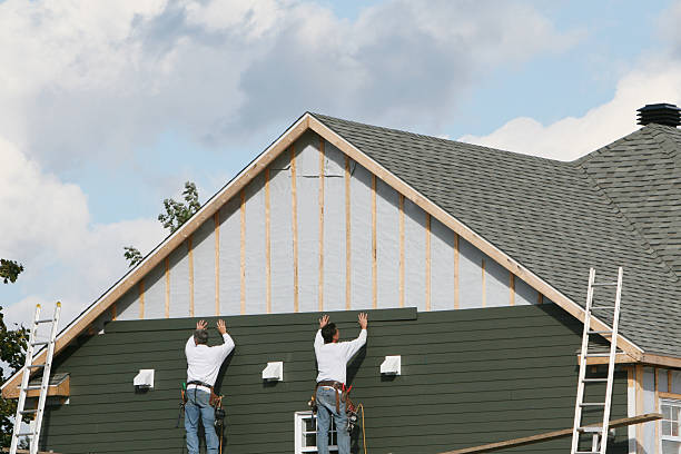 Professional Emergency Siding Repair technician working in Fultonham, OH